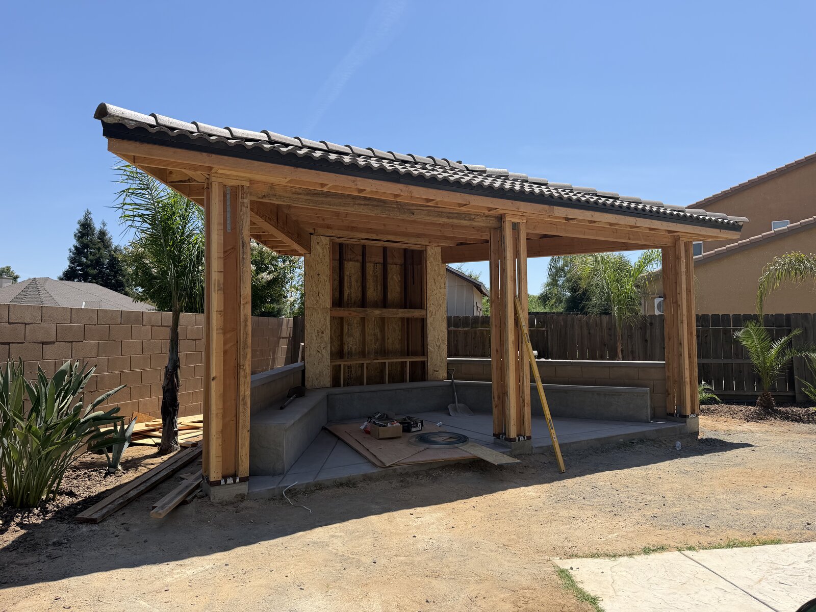Covered Patio by AMV Construction